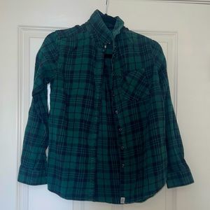 Moderately worn green and black flannel in a size small